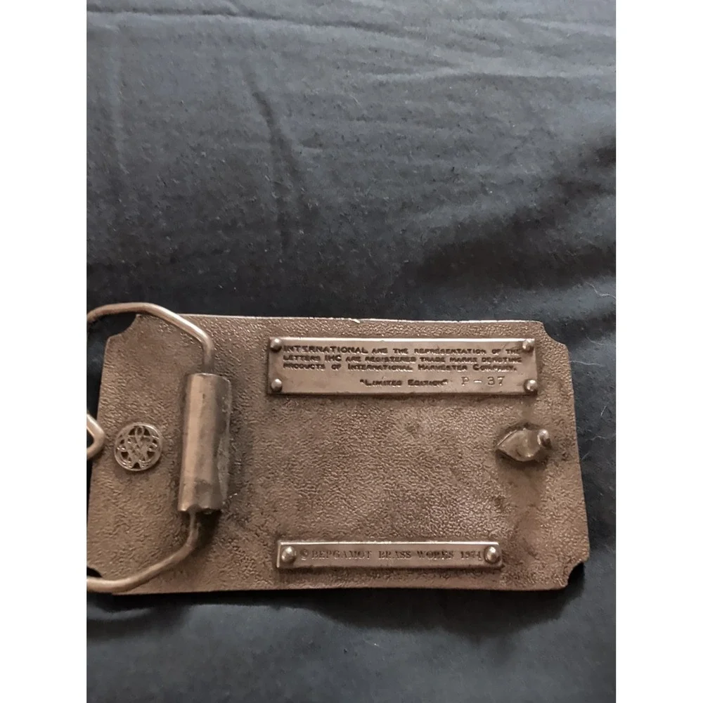 Belt Buckle - International Auto Wagon